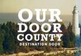 The words Our Door County over a background with a white lighthouse.